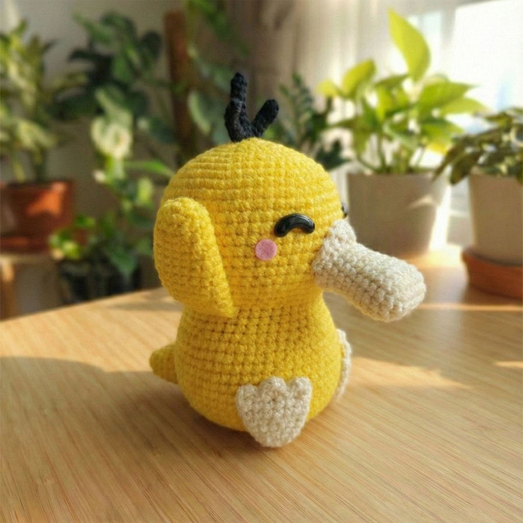 Psyduck amigurumi Pokémon - Creazione artigianale all'uncinetto fatta a mano.
