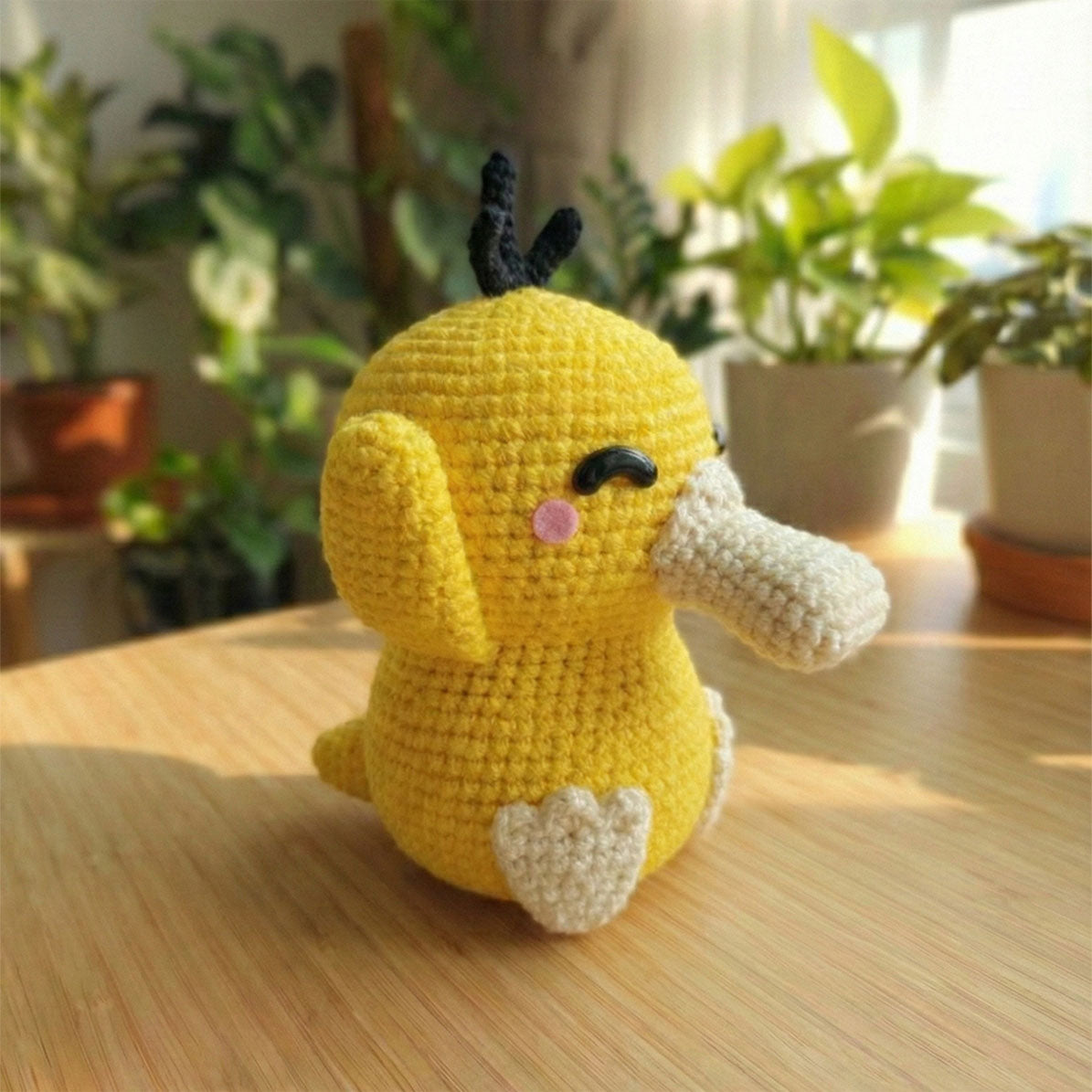 Psyduck amigurumi Pokémon - Creazione artigianale all'uncinetto fatta a mano.